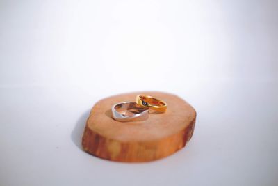 High angle view of apple on table against white background