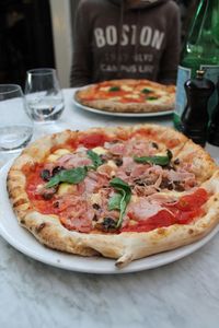 Close-up of pizza served on table