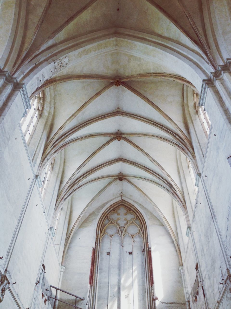 architecture, church, arch, place of worship, built structure, religion, indoors, spirituality, low angle view, cathedral, ceiling, building exterior, interior, architectural feature, history, no people, day, window