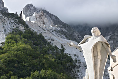 View of buddha statue on mountain