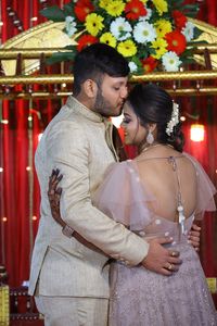 Young couple standing outdoors