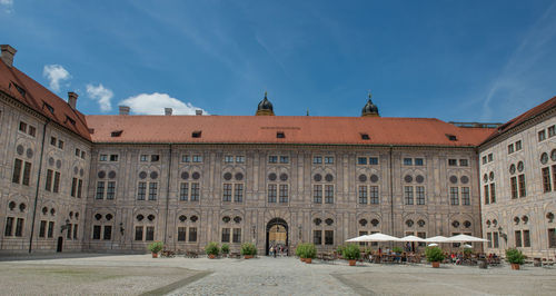 Buildings in city against sky