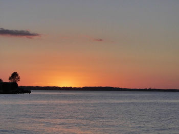 View of calm sea at sunset