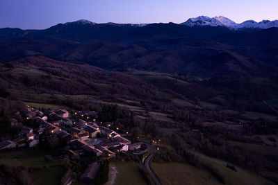 High angle view of buildings on mountain against sky