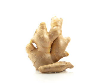 Close-up of bread against white background