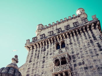 Low angle view of historic building against clear sky