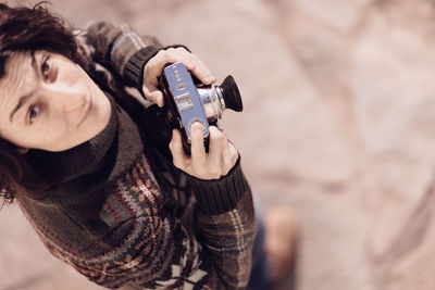 Close-up of man photographing