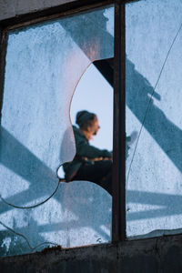 Portrait of woman by window