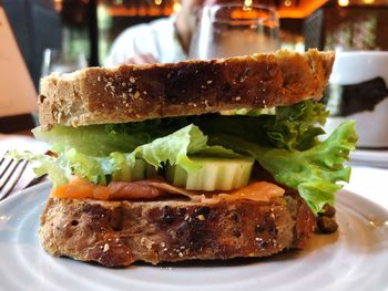 Close-up of burger in plate on table