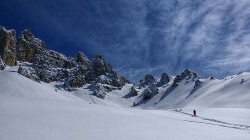 Scenic view of snowcapped mountain against sky