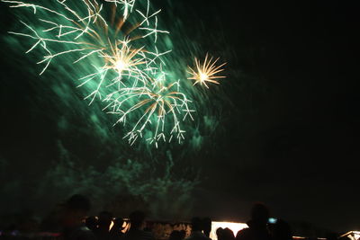 Firework display at night