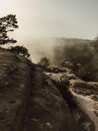 Scenic view of rocky landscape against sky