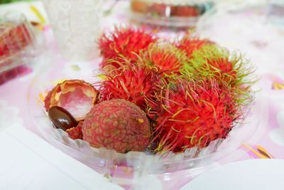 Close-up of fruits in plate on table