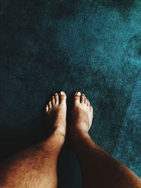 Low section of woman standing on floor