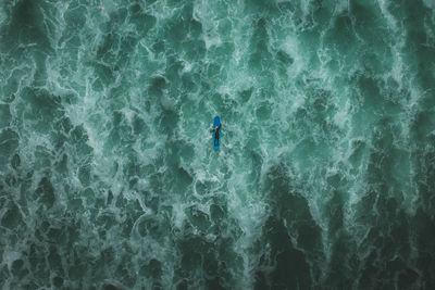 High angle view of man in sea