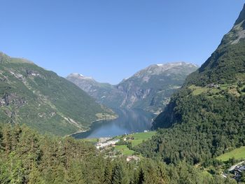 Scenic view of mountains against clear blue sky