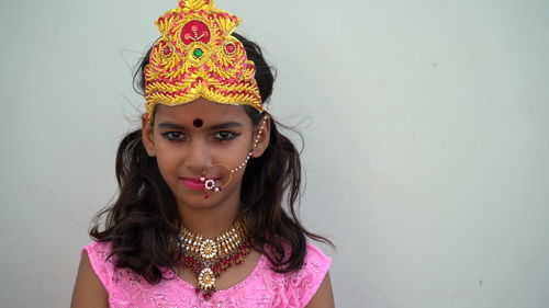 Portrait of beautiful indian brunette girl faces with traditional dress like goddess