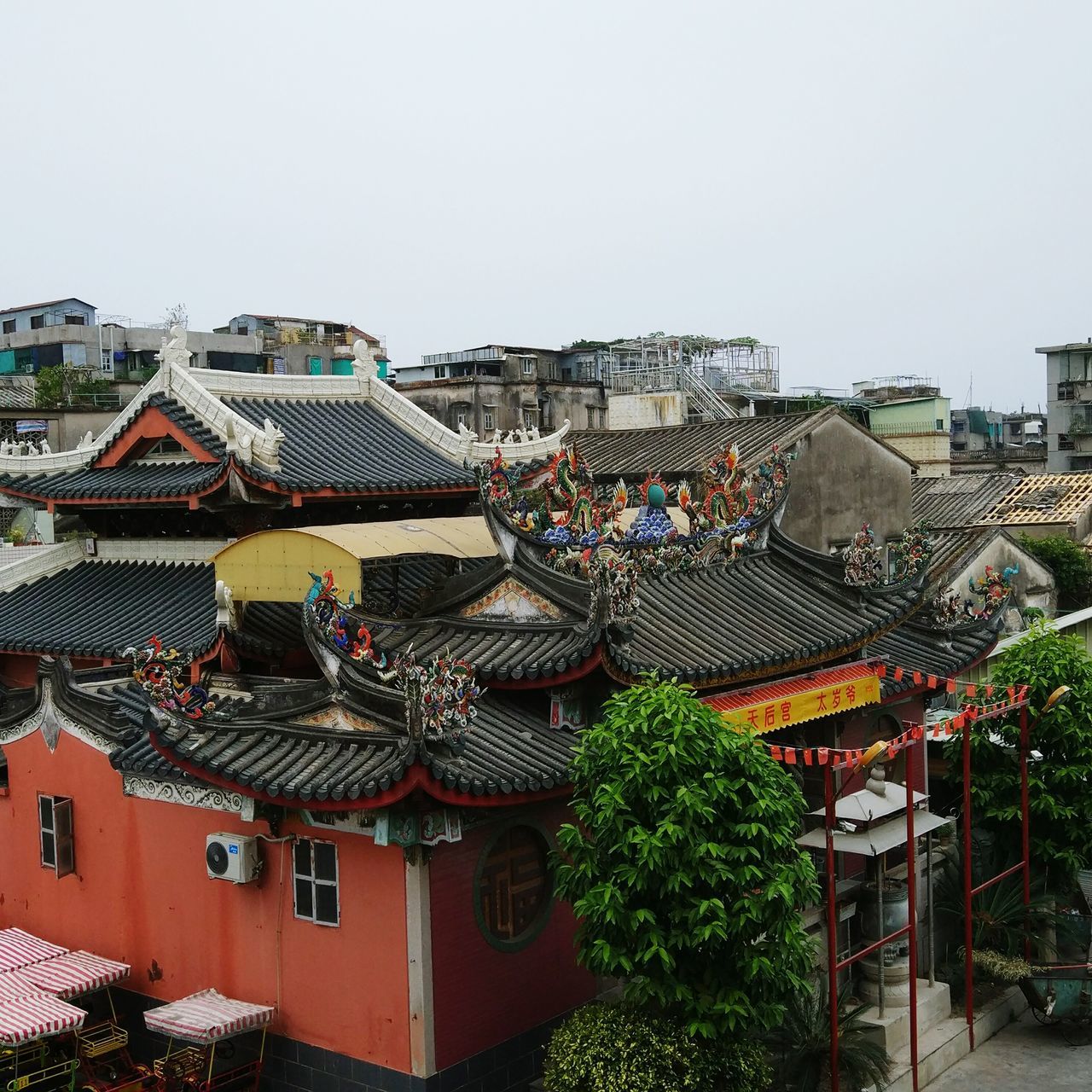 building exterior, architecture, built structure, roof, day, outdoors, clear sky, high angle view, no people, sky, city