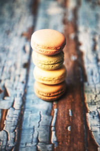 Close-up of rusty stack on table