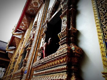 Low angle view of statue at temple