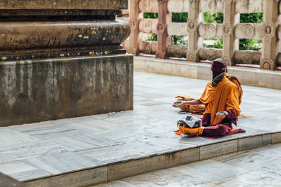 Man sitting at temple