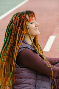 Portrait of young woman looking away