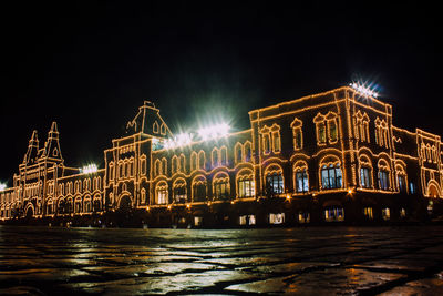 Illuminated building at night