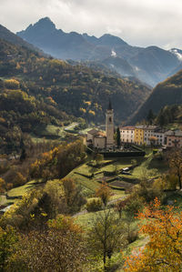 High angle view of building and mountains against sky