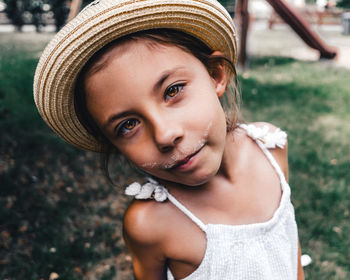 Portrait of smiling girl wearing hat