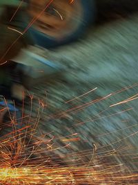 High angle view of light trails over lake