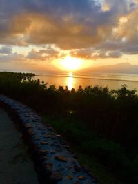 Scenic view of sea at sunset