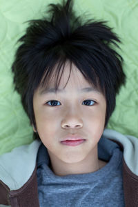 Close-up portrait of smiling boy