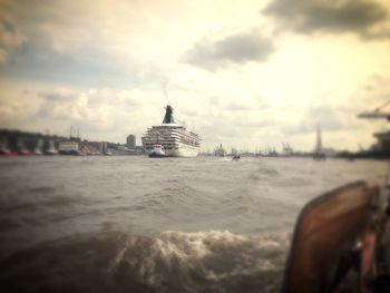View of buildings against cloudy sky