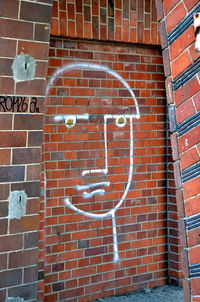 Low angle view of brick wall