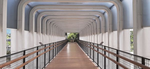 Rear view of man on bridge