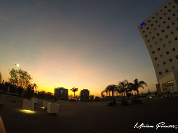 Scenic view of beach against sky during sunset