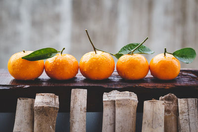 Close-up of fruits on wood