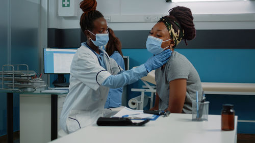 Female dentist working in laboratory