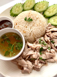 Street food in  south asia includes thailand  called   chicken rice 