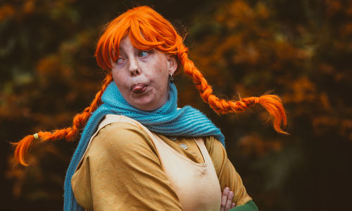 Portrait of woman in park during winter