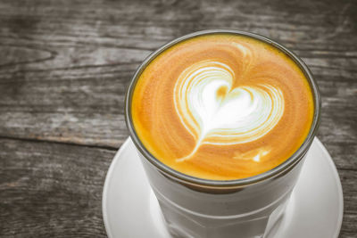 High angle view of cappuccino on table