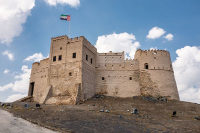 Low angle view of historic building against sky