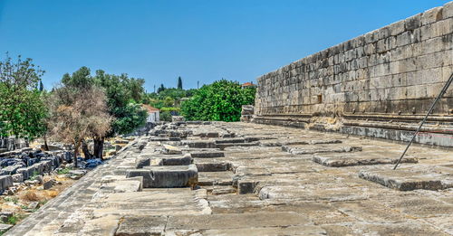 Ruins of temple against clear sky