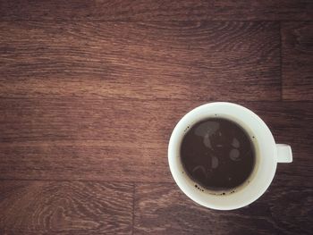 High angle view of coffee cup on table