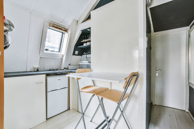 Empty chairs and table at home