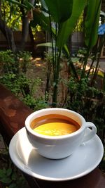 High angle view of coffee cup on table