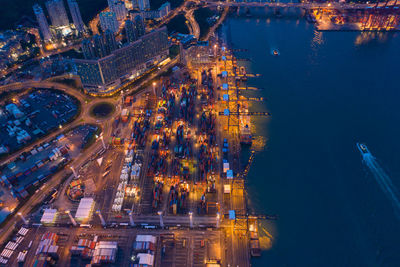 High angle view of illuminated buildings at night