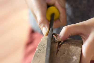 Close-up of polishing finger ring