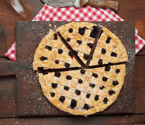 Directly above shot of cake slice on cutting board