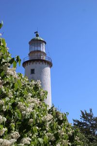 Low angle view of water tower against clear sky